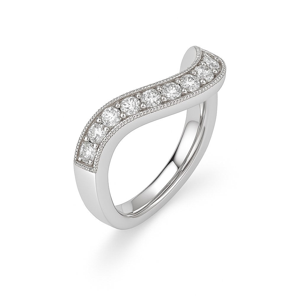 Elegant Moissanite wave ring in white gold-plated 925 silver, featuring pavé brilliance and fine milgrain detail. Hypoallergenic. Available now at BSI Jewelry.