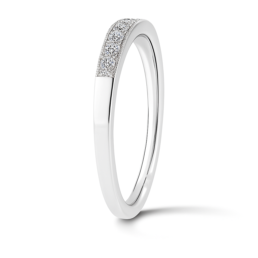 Classic Moissanite wedding band in 925 silver with brilliance and milgrain detail. Finely crafted, hypoallergenic, and timelessly elegant. Now at BSI Jewelry.