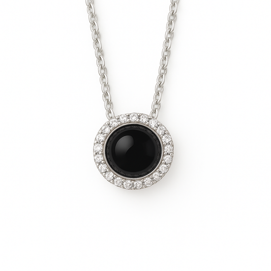 Bold onyx cabochon pendant accented with Moissanite in 925 silver. 6mm gem, hypoallergenic, and modern elegance. Available now at BSI Jewelry.