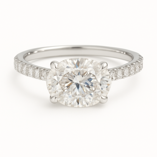 Timeless Moissanite oval-cut engagement ring in white-gold-plated 925 silver, featuring a 7×5mm center with pavé band for radiant brilliance. Now at BSI Jewelry.