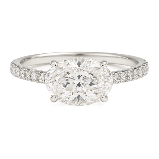 Timeless Moissanite oval-cut engagement ring in white-gold-plated 925 silver, featuring a 7×5mm center with pavé band for radiant brilliance. Now at BSI Jewelry.