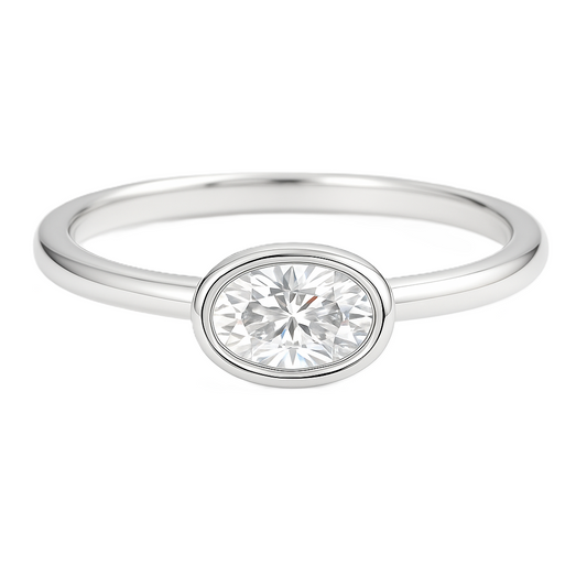 Elegant Moissanite oval ring with 4×2 mm oval-cut stone in white gold-plated 925 silver. Timeless sparkle, hypoallergenic design. Available now at BSI Jewelry.