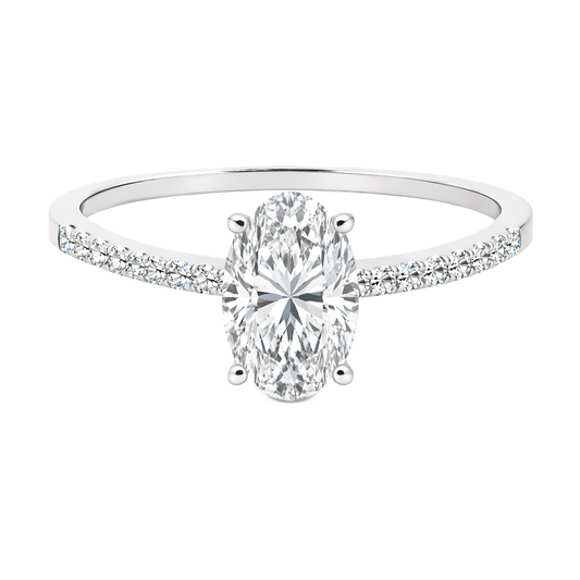 Moissanite oval ring with a 7×5 mm oval-cut stone, accented by moissanite in white gold-plated 925 silver. Elegant and timeless. Available now at BSI Jewelry.