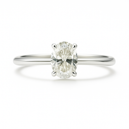 Elegant Moissanite oval solitaire ring with 6×4 mm stone in white gold-plated 925 silver. Radiant sparkle and hypoallergenic comfort. Available at BSI Jewelry.
