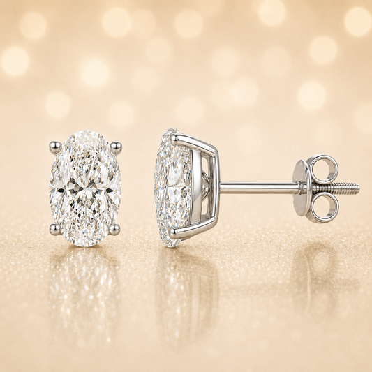 Moissanite oval stud earrings in 5×3 mm, crafted in white gold-plated 925 silver with screw-back posts. Safe for sensitive skin. Available now at BSI Jewelry.
