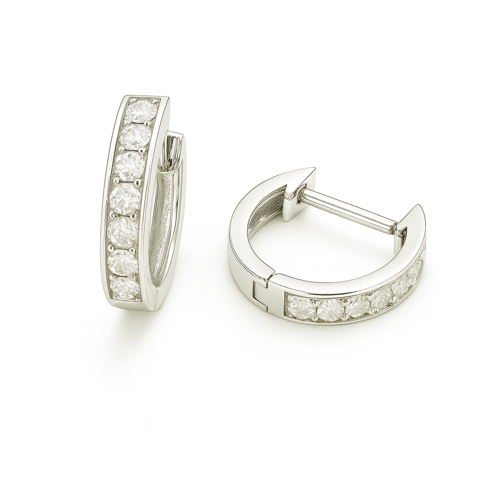 2.5 mm moissanite pave set huggies earrings in white gold-plated 925 silver. Sleek, refined and hypoallergenic for daily wear. Available now at BSI Jewelry.