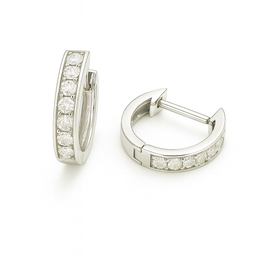 2.5 mm moissanite pave set huggies earrings in white gold-plated 925 silver. Sleek, refined and hypoallergenic for daily wear. Available now at BSI Jewelry.