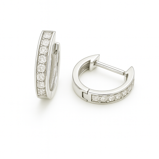 2 mm moissanite pave set huggies earrings in white gold-plated 925 silver. Sleek, refined and hypoallergenic for daily wear. Available now at BSI Jewelry.