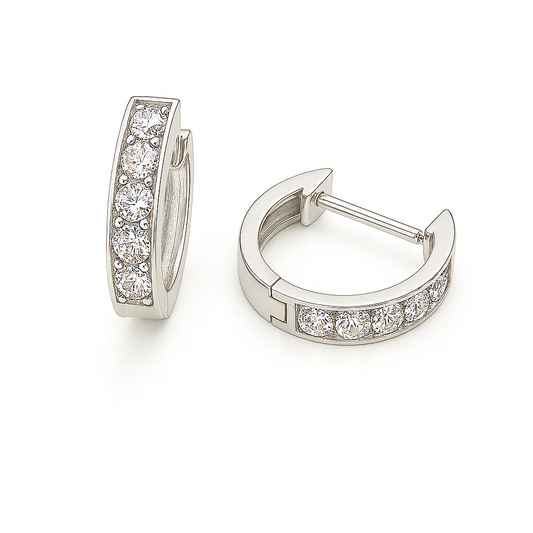 3.5 mm moissanite pave set huggies earring in white gold-plated 925 silver. Sleek, refined and hypoallergenic for daily wear. Available now at BSI Jewelry.
