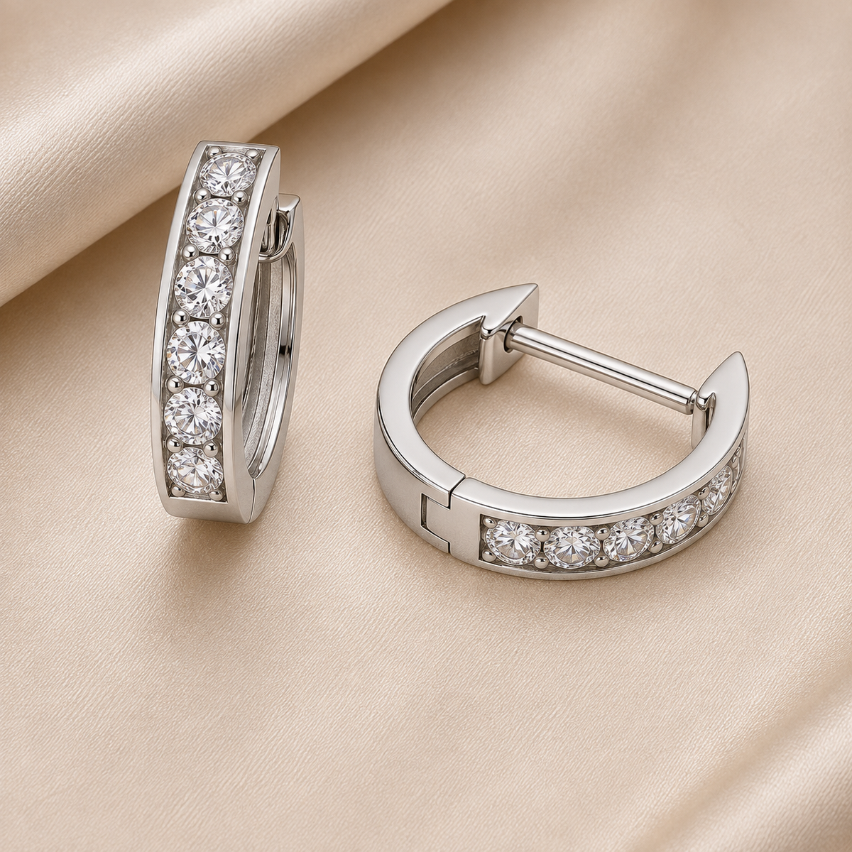 3 mm moissanite pave set huggies earrings in white gold-plated 925 silver. Sleek, refined and hypoallergenic for daily wear. Available now at BSI Jewelry.