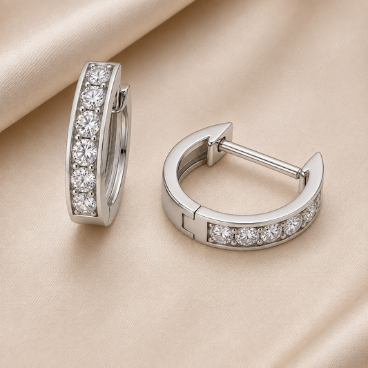 3 mm moissanite pave set huggies earrings in white gold-plated 925 silver. Sleek, refined and hypoallergenic for daily wear. Available now at BSI Jewelry.