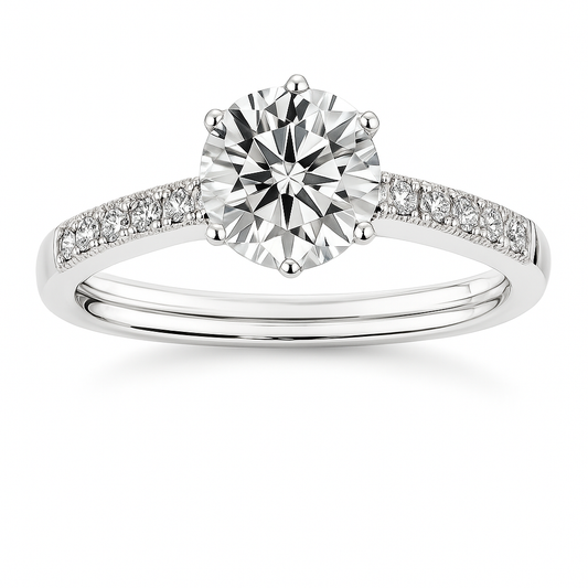 Dazzling Moissanite pavé solitaire ring in 925 silver with 6.5 mm round brilliant-cut stone. White gold-plated, hypoallergenic and elegant. Now at BSI Jewelry.