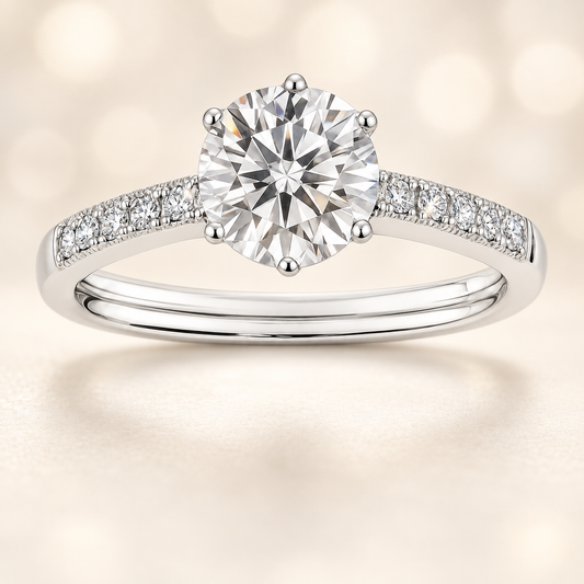Dazzling Moissanite pavé solitaire ring in 925 silver with 6.5 mm round brilliant-cut stone. White gold-plated, hypoallergenic and elegant. Now at BSI Jewelry.
