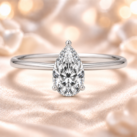 6x4mm pear Moissanite solitaire in white gold-plated 925 silver with a palladium-added alloy—elegant, radiant, and hypoallergenic. Available now at BSI Jewelry.