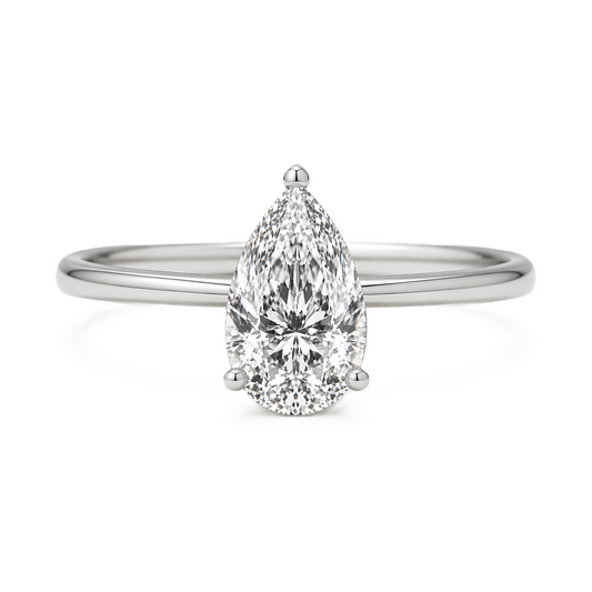 7x5mm pear Moissanite solitaire in white gold-plated 925 silver with a palladium-added alloy—elegant, radiant, and hypoallergenic. Available now at BSI Jewelry.