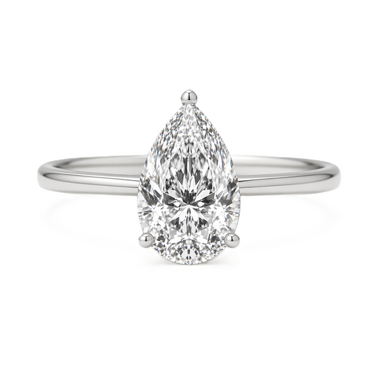 8x6mm pear Moissanite solitaire in white gold-plated 925 silver with a palladium-added alloy—elegant, radiant, and hypoallergenic. Available now at BSI Jewelry.
