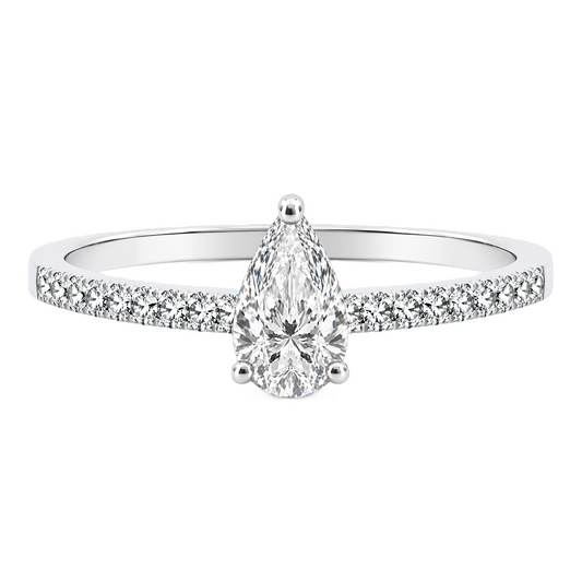 Moissanite pear ring with a 7×5 mm pear-cut stone, accented by moissanite in white gold-plated 925 silver. Elegant and timeless. Available now at BSI Jewelry.