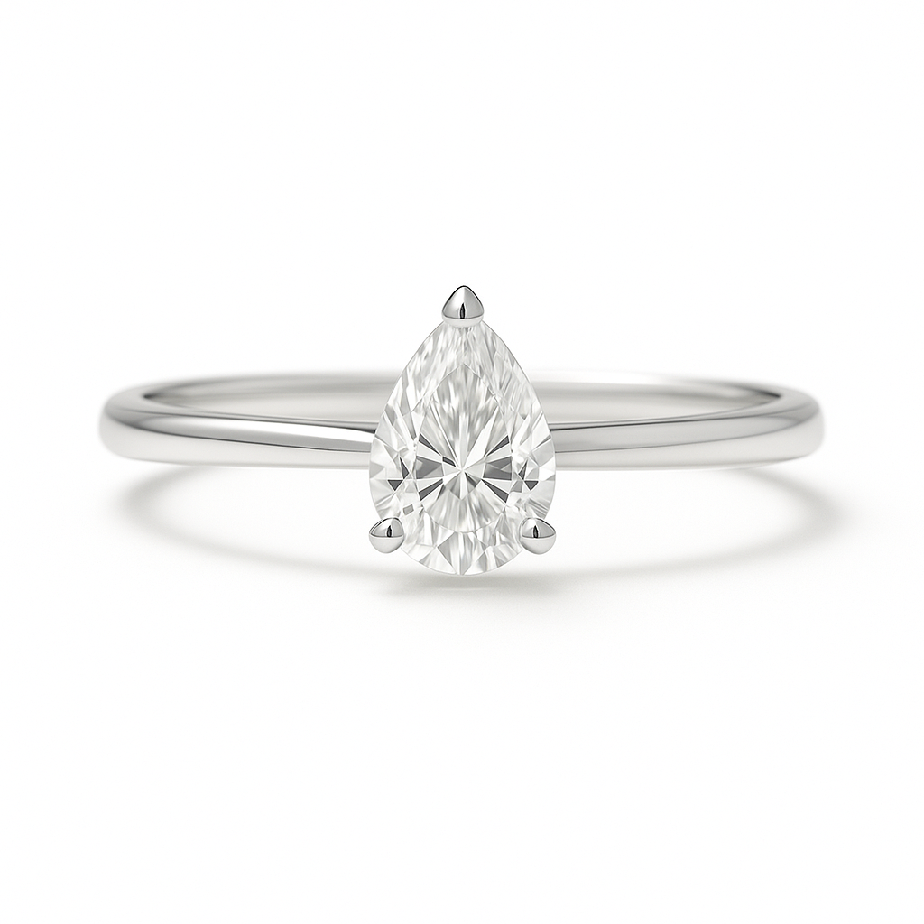 Elegant Moissanite pear solitaire ring with 6×4 mm pear in white gold-plated 925 silver. Radiant sparkle with hypoallergenic comfort. Available at BSI Jewelry.