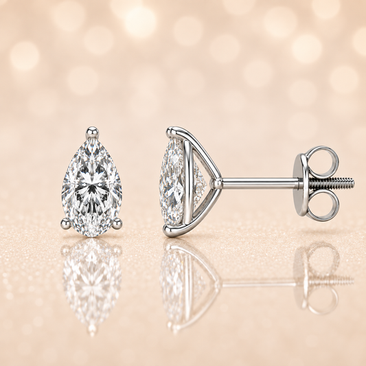 Moissanite pear stud earrings in 5×3 mm, crafted in white gold-plated 925 silver with screw-back posts. Safe for sensitive skin. Available now at BSI Jewelry.