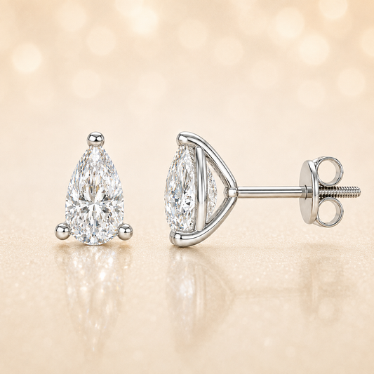 Moissanite pear stud earrings in 5×3 mm, crafted in white gold-plated 925 silver with screw-back posts. Safe for sensitive skin. Available now at BSI Jewelry.