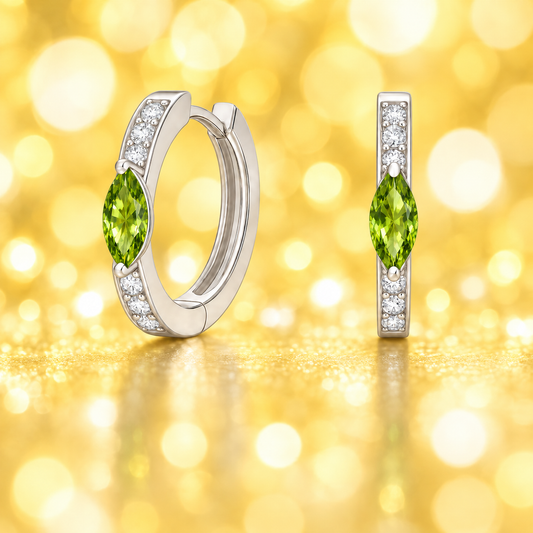 Huggie earrings with Peridot marquise and Moissanite accents in white gold-plated 925 silver. Hypoallergenic, safe to wear. Available at BSI Jewelry.