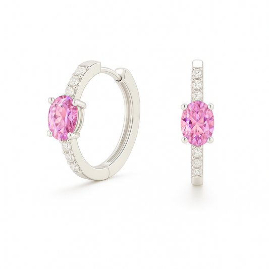 Elegant oval-cut pink amethyst huggie earrings in white gold-plated 925 silver with sparkling Moissanite accents for soft, rosy charm. Available at BSI Jewelry.
