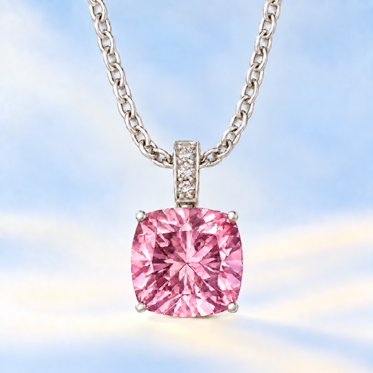 Moissanite and pink amethyst pendant with a 6 mm cushion-cut gemstone in white gold-plated 925 silver. Soft and elegant. Available now at BSI Jewelry.