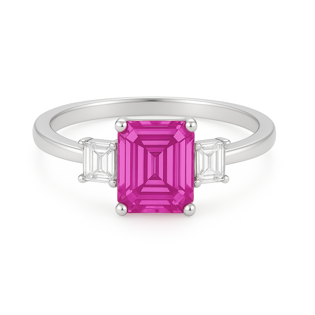 7×5 mm emerald-cut pink sapphire ring with baguette Moissanite accents, crafted in white-gold-plated 925 silver. Romantic and elegance. Available at BSI Jewelry