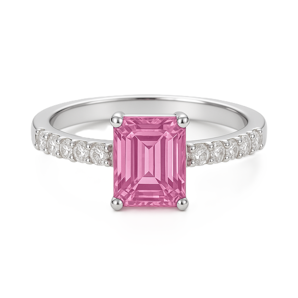 7×5mm emerald-cut Pink Sapphire ring with Moissanite accents in white-gold-plated 925 silver. Romantic, elegant, and hypoallergenic. Available at BSI Jewelry.