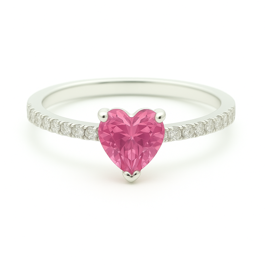 6mm heart-cut Pink Sapphire ring with Moissanite accents in white-gold-plated 925 silver. Romantic, finely crafted, and hypoallergenic. Available at BSI Jewelry.