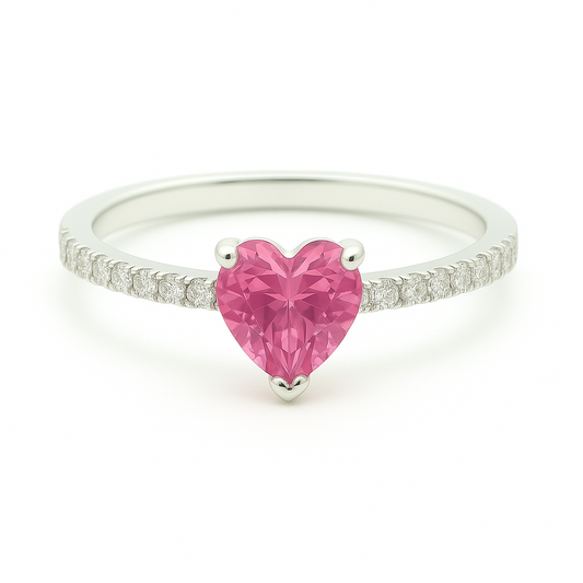 6mm heart-cut Pink Sapphire ring with Moissanite accents in white-gold-plated 925 silver. Romantic, finely crafted, and hypoallergenic. Available at BSI Jewelry.