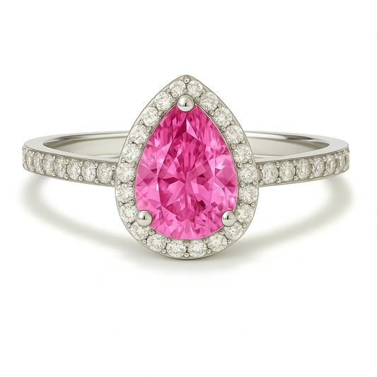 7×5 mm pear-cut pink sapphire ring with Moissanite halo in white-gold-plated 925 silver. Elegant brilliance and romantic charm. Available now at BSI Jewelry.