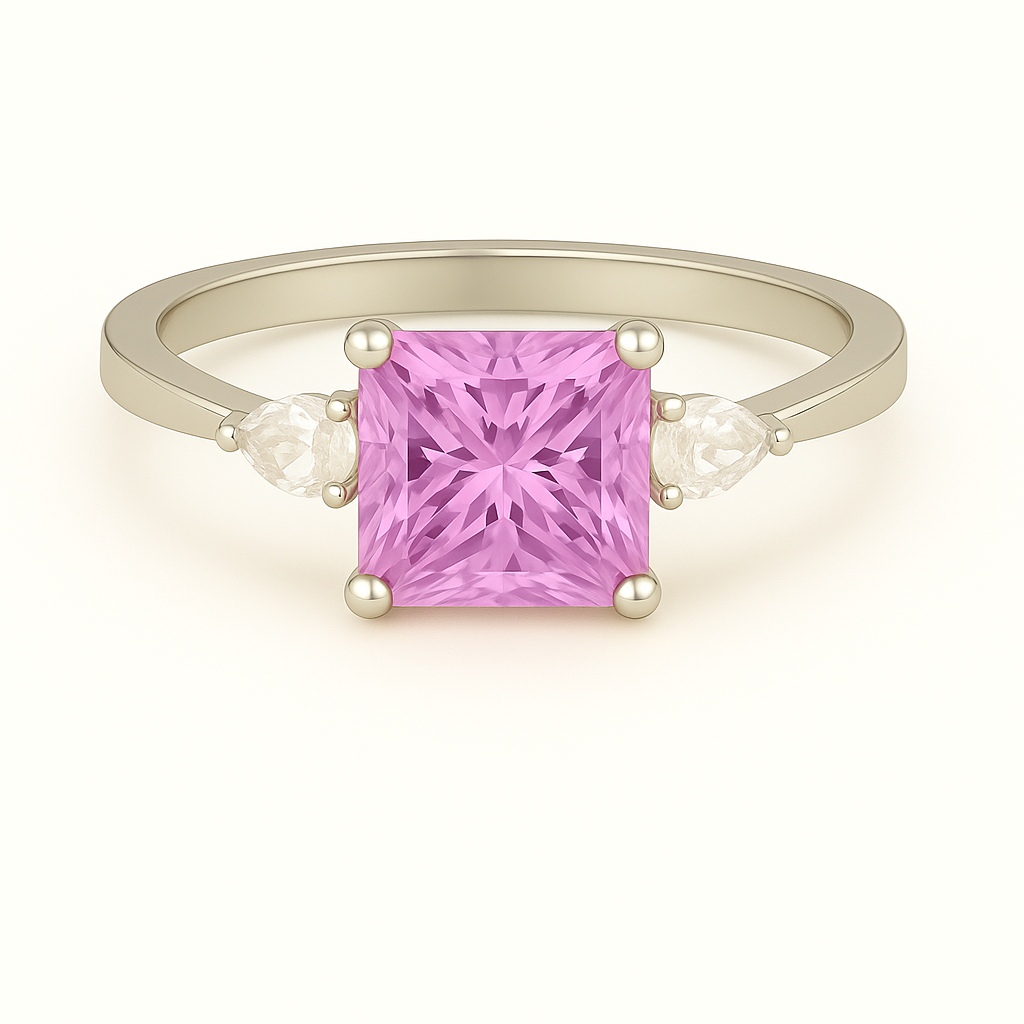 6 mm princess-cut pink sapphire ring with Moissanite accents in white-gold-plated 925 silver. Radiant sparkle and timeless elegance. Available at BSI Jewelry.