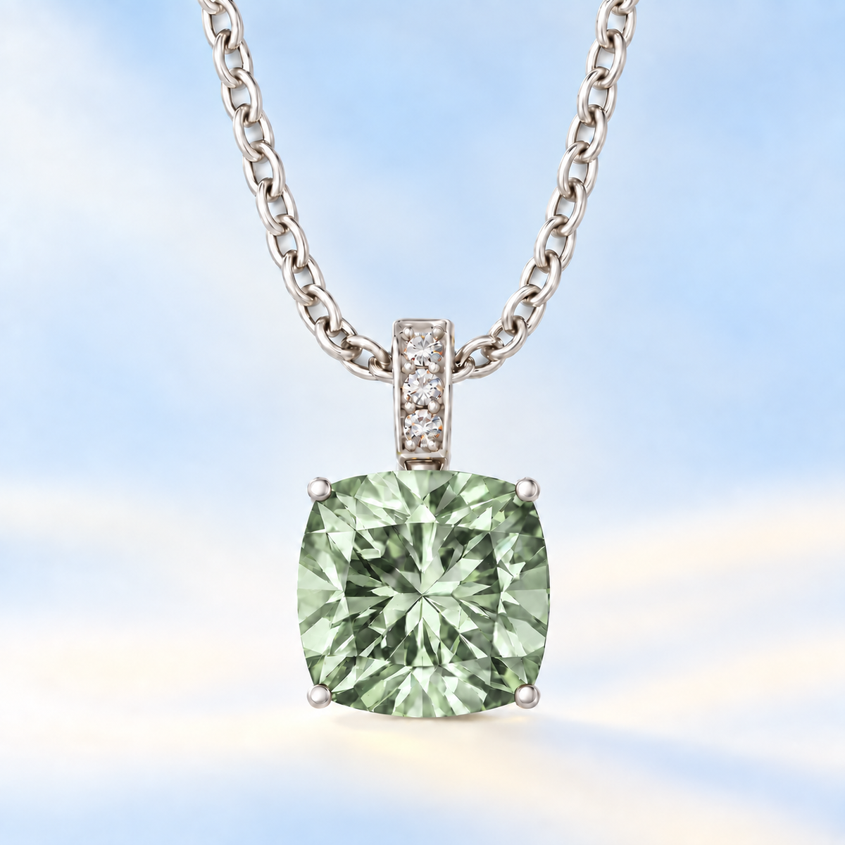 Moissanite and prasolite pendant with a 6 mm cushion-cut gemstone in white gold-plated 925 silver. Fresh and elegant. Available now at BSI Jewelry.