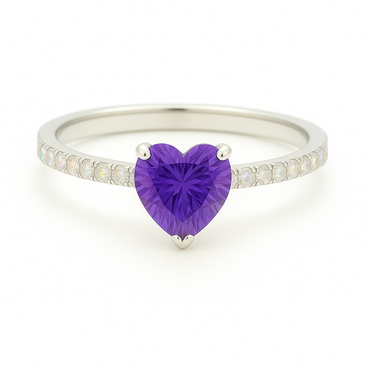 6mm heart-cut Purple Sapphire ring with Moissanite accents in white-gold-plated 925 silver. Romantic, timeless, and hypoallergenic. Available now at BSI Jewelry.