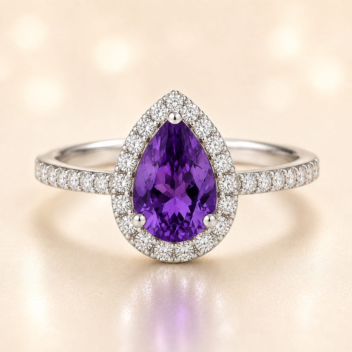 7×5 mm pear-cut purple sapphire ring with Moissanite halo in white-gold-plated 925 silver. Majestic color and timeless elegance. Available now at BSI Jewelry.
