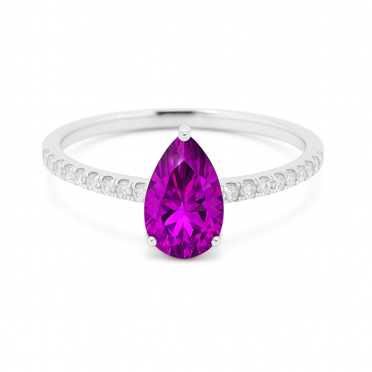 7×5 mm pear purple sapphire ring with Moissanite on white gold-plated 925 silver. Elegant, radiant, and hypoallergenic. Available now at BSI Jewelry.