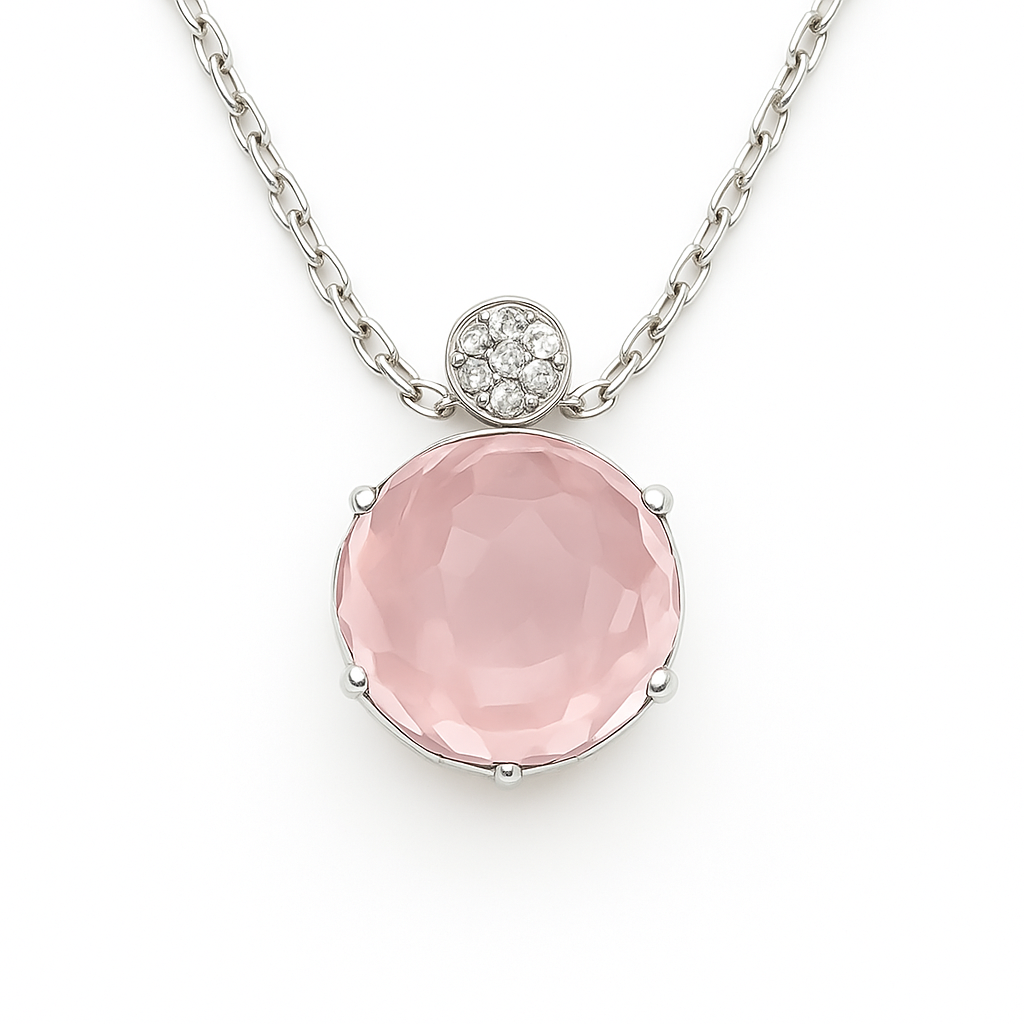 Soft rose quartz cabochon pendant accented with Moissanite in 925 silver. 9 mm gem, hypoallergenic design and timeless feminine charm. Available at BSI Jewelry.