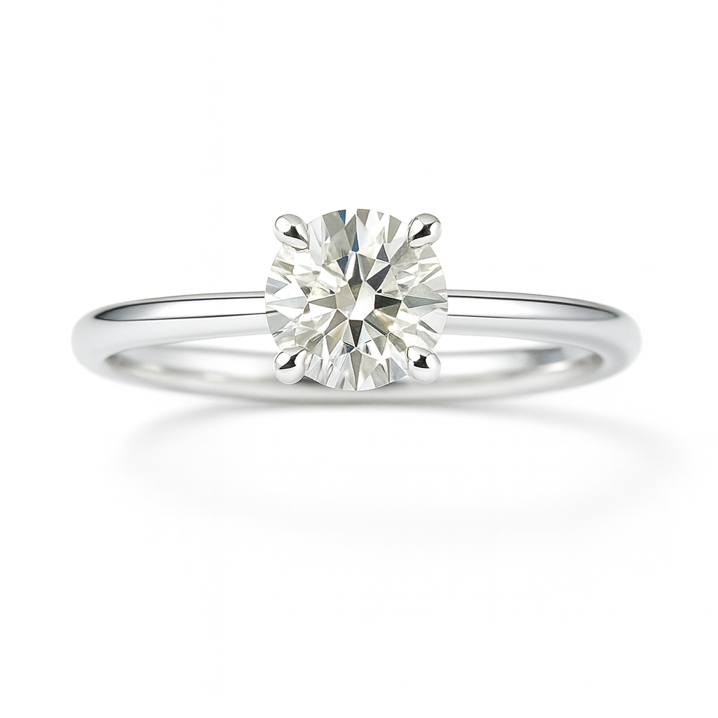 0.20 carat round moissanite solitaire ring in white gold-plated 925 silver. Brilliant sparkle and refined elegance for any occasion. Available now at BSI Jewelry.