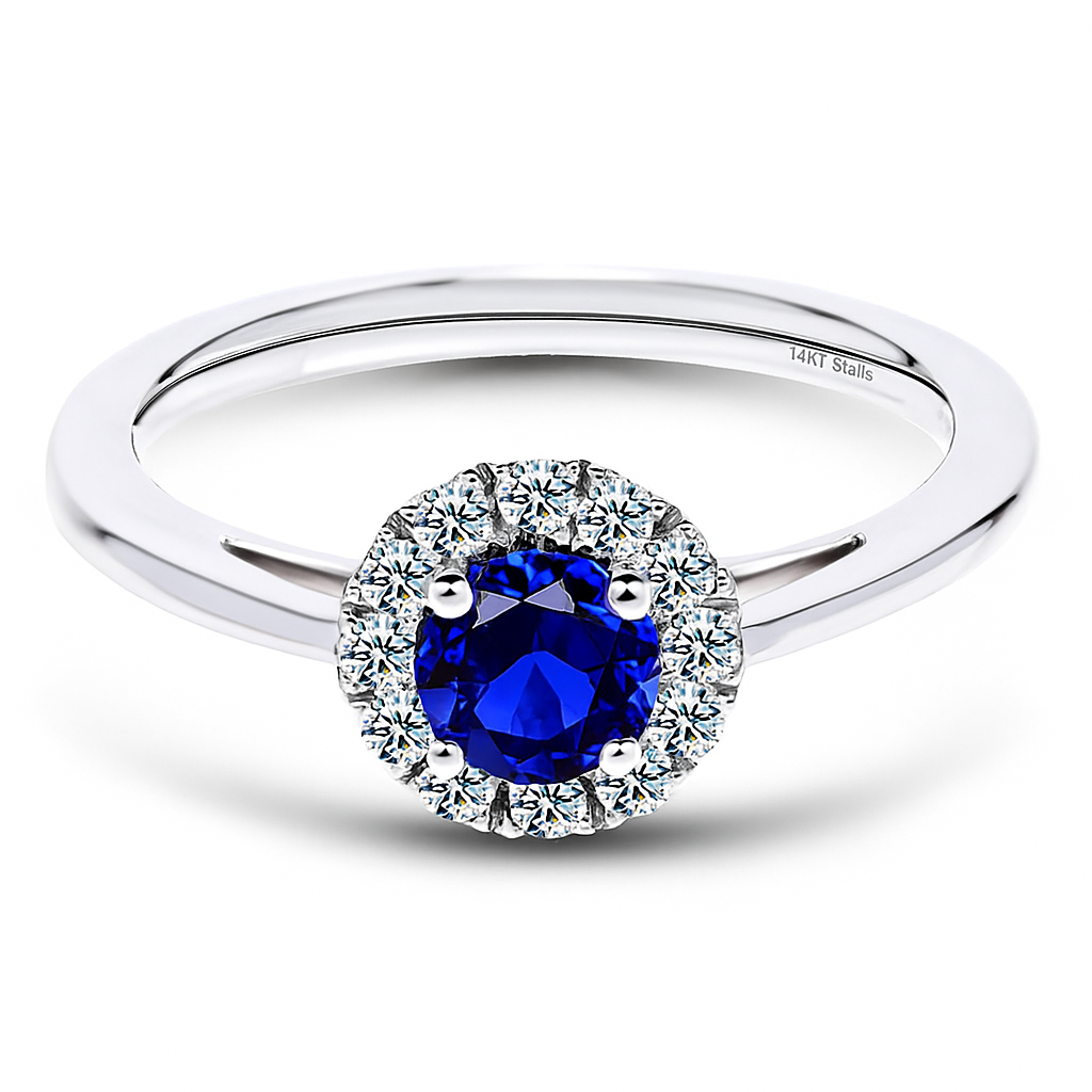 Sapphire halo ring in white gold-plated 925 silver, accented with sparkling Moissanite. Timeless brilliance and hypoallergenic comfort. Available at BSI Jewelry.