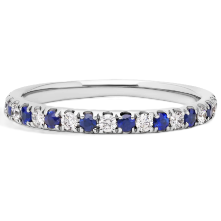 Moissanite & sapphire wedding band with 2mm round stones in white gold-plated 925 silver and palladium alloy. Radiant and elegant. Available now at BSI Jewelry.