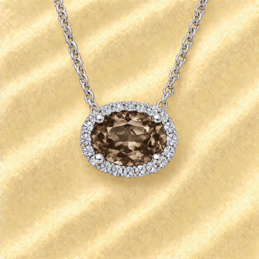 Moissanite and smoky quartz necklace with 9×7 mm oval gemstone in white gold-plated 925 silver with moissanite. Warm and elegant. Available now at BSI Jewelry.