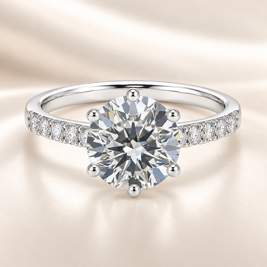 1-carat Moissanite solitaire ring in white gold-plated 925 silver with pavé accents. Elegant brilliance for timeless love. Available now at BSI Jewelry.