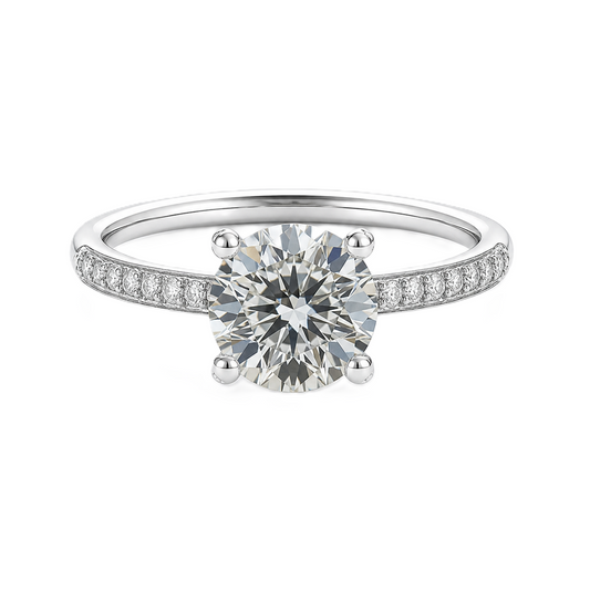 1.00 carat Moissanite solitaire engagement ring with pave-set band in white-gold-plated 925 silver. Elegant and timeless charm. Available now at BSI Jewelry.