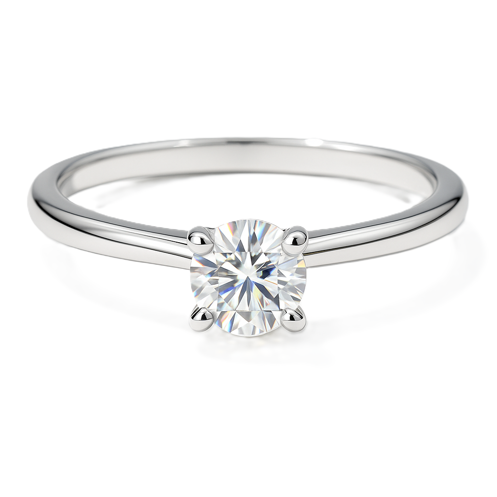 Moissanite solitaire ring with 3 mm round stone, crafted in white-gold-plated 925 silver. Timeless sparkle and refined elegance. Available now at BSI Jewelry.