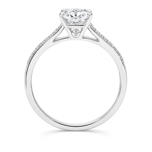Elegant Moissanite solitaire ring in 925 silver with 6.5 mm round brilliant-cut stone. White gold-plated, hypoallergenic and radiant. Now at BSI Jewelry.