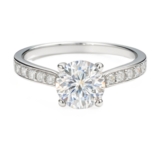 Elegant Moissanite solitaire ring in 925 silver with 6.5 mm round brilliant-cut stone. White gold-plated, hypoallergenic and radiant. Now at BSI Jewelry.