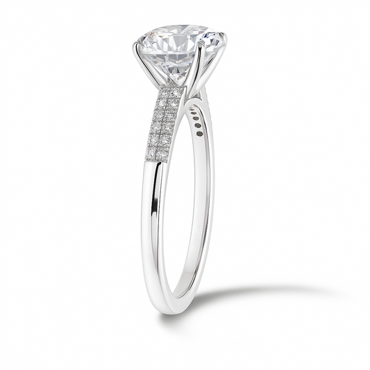 Brilliant Moissanite solitaire ring with 8 mm round-cut stone in white gold-plated 925 silver. Radiant sparkle and hypoallergenic comfort. Available at BSI Jewelry.