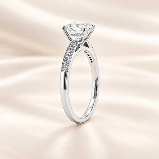 Brilliant Moissanite solitaire ring with 8 mm round-cut stone in white gold-plated 925 silver. Radiant sparkle and hypoallergenic comfort. Available at BSI Jewelry.