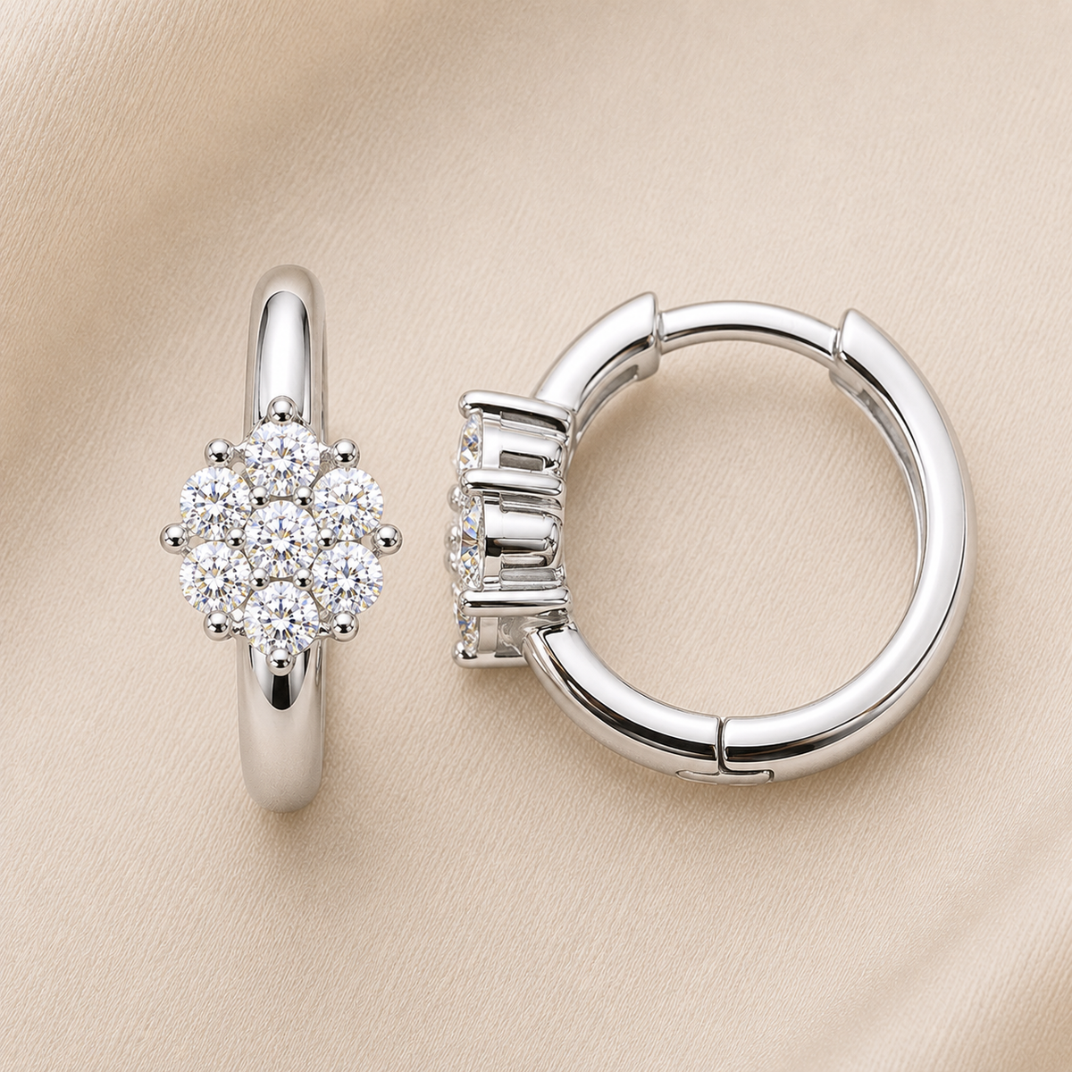 Moissanite star huggie earrings in 925 silver with a star cluster. Sparkling design adding charm and brilliance to everyday style. Available now at BSI Jewelry.